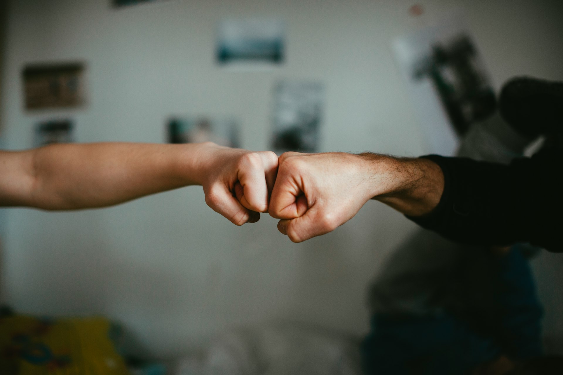 person holding babys hand